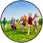 Children running in field